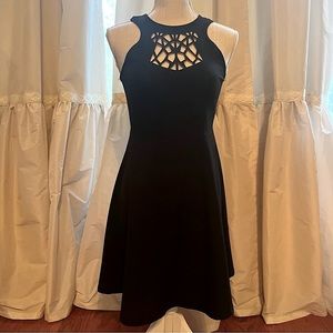 Ya size medium black dress with beautiful cut out design on yolk.